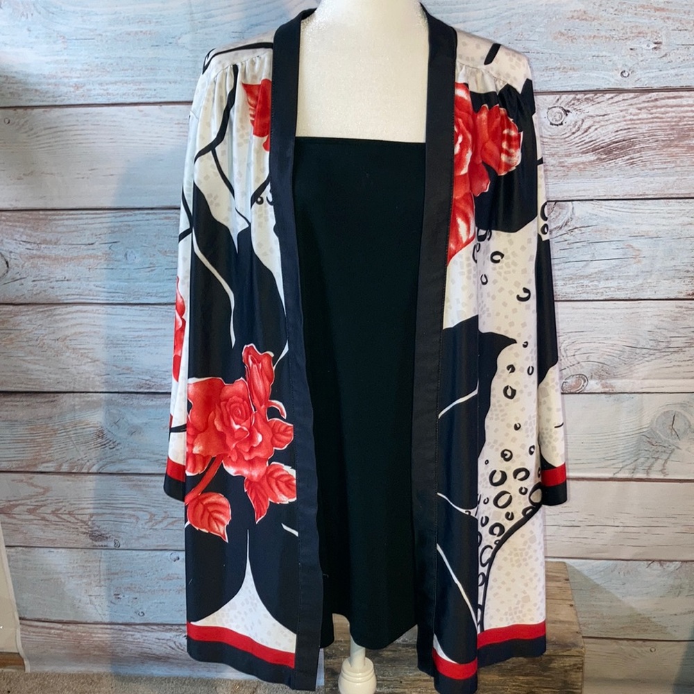 Top Notch tunic top with layered look. Size 56 which is equivalent to a …